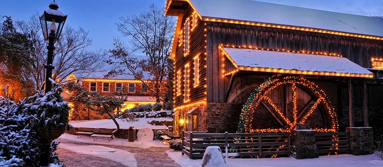 Peddler’s Village in Lahaska Pennsylvania decorated with holiday lights and snow - Same Day Oil Delivery
