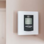 Adjusting a home thermostat at the start of heating season