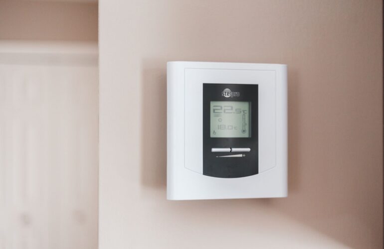 Adjusting a home thermostat at the start of heating season